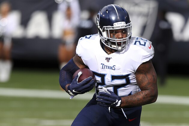 Tennessee running back Derrick Henry runs the ball during the Titans 42-21 win against the Oakland Raiders in a NFL football game Sunday, Dec. 8, 2019 in Oakland, CA. (Daniel Gluskoter/AP Images for Panini)