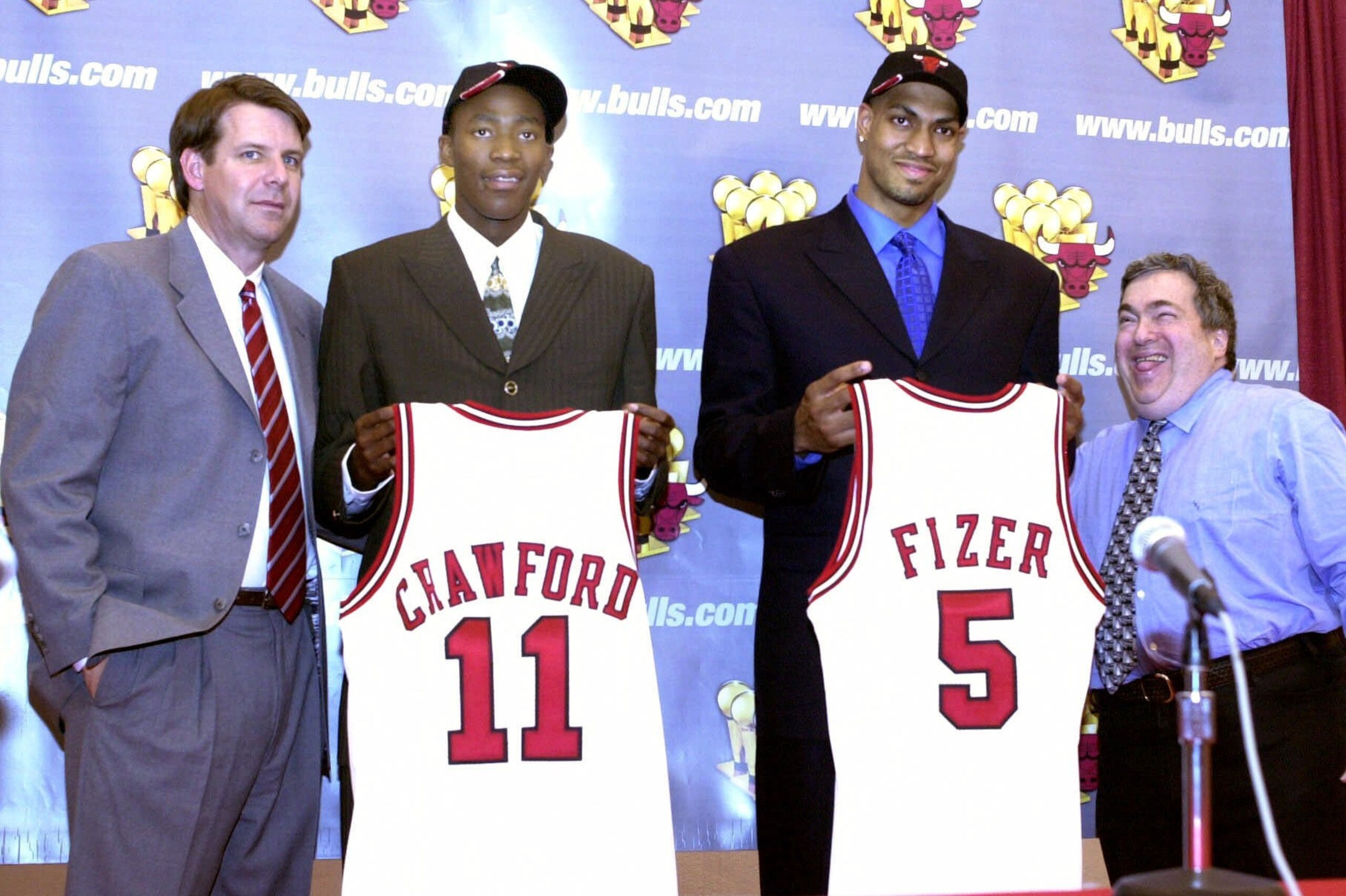 Chicago Bulls first-round draft picks Jamal Crawford (11) and Marcus Fizer (5), flanked by Bulls coach Tim Floyd, left, and general manager Jerry Krause, right, field questions from the media at the Berto Center, the Bulls practice facility in Deerfield, Ill., Thursday, June 29, 2000. (AP Photo/Brian Kersey) Chicago Bulls first-round draft picks Jamal Crawford (11) and Marcus Fizer (5), flanked by Bulls coach Tim Floyd, left, and general manager Jerry Krause, right, field questions from the media at the Berto Center, the Bulls practice facility in Deerfield, Ill., Thursday, June 29, 2000. (AP Photo/Brian Kersey)