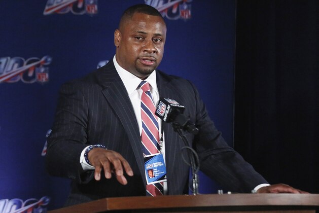 FILE - In this May 22, 2019, file photo, NFL vice president Troy Vincent speaks to the media during an owners meetings in Key Biscayne, Fla. Vincent has sent a letter to several prospects inviting them to participate “live” in the NFL draft in three weeks. The Associated Press on TuesdayMarch 31, 2020, obtained the letter sent by the league's football operations chief to prospective early selections in the draft, which will be held remotely on April 23-25 due to the coronavirus pandemic. (AP Photo/Brynn Anderson, File) FILE - In this May 22, 2019, file photo, NFL vice president Troy Vincent speaks to the media during an owners meetings in Key Biscayne, Fla. Vincent has sent a letter to several prospects inviting them to participate “live” in the NFL draft in three weeks. The Associated Press on TuesdayMarch 31, 2020, obtained the letter sent by the league's football operations chief to prospective early selections in the draft, which will be held remotely on April 23-25 due to the coronavirus pandemic. (AP Photo/Brynn Anderson, File)