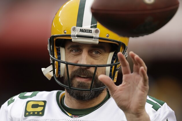 FILE - In this Jan. 19, 2020, file photo, Green Bay Packers quarterback Aaron Rodgers warms up before the NFL NFC Championship football game against the San Francisco 49ers in Santa Clara, Calif. The Packers would love to give quarterback Aaron Rodgers more weapons as they attempt to make at least one more Super Bowl run with the 36-year-old, two-time MVP. That doesnâ€™t necessarily mean you should pencil in a receiver to Green Bay with the 30th overall pick at the NFL Draft. (AP Photo/Ben Margot, File)