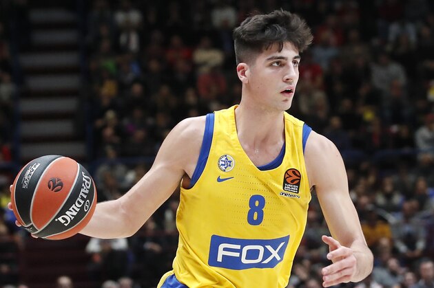 Maccabi Fox Tel Aviv's Deni Avdija controls the ball during the Euro League basketball match between Olimpia Milan and Maccabi Fox Tel Aviv, in Milan, Italy, Tuesday, Nov. 19, 2019. (AP Photo/Antonio Calanni)
