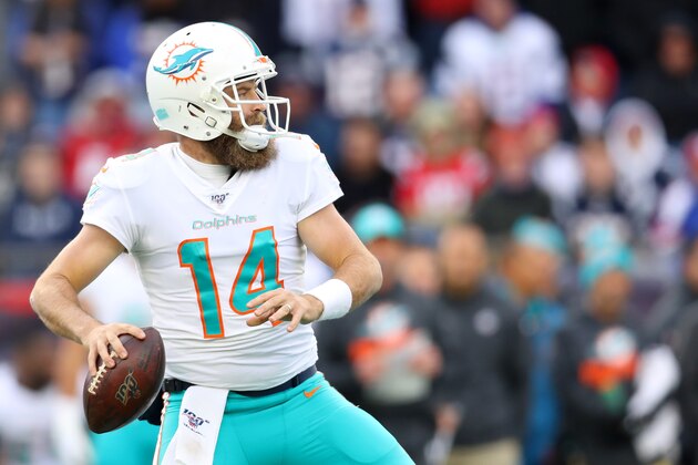 FOXBOROUGH, MASSACHUSETTS - DECEMBER 29: Ryan Fitzpatrick #14 of the Miami Dolphins looks to pass against the New England Patriots  at Gillette Stadium on December 29, 2019 in Foxborough, Massachusetts. (Photo by Maddie Meyer/Getty Images)