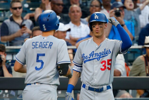 NEW YORK, NY - AUGUST 05:  (NEW YORK DAILIES OUT)   Cody Bellinger #35 and Corey Seager #5 of the Los Angeles Dodgers in action against the New York Mets at Citi Field on August 5, 2017 in the Flushing neighborhood of the Queens borough of New York City. The Dodgers defeated the Mets 7-4.  (Photo by Jim McIsaac/Getty Images)