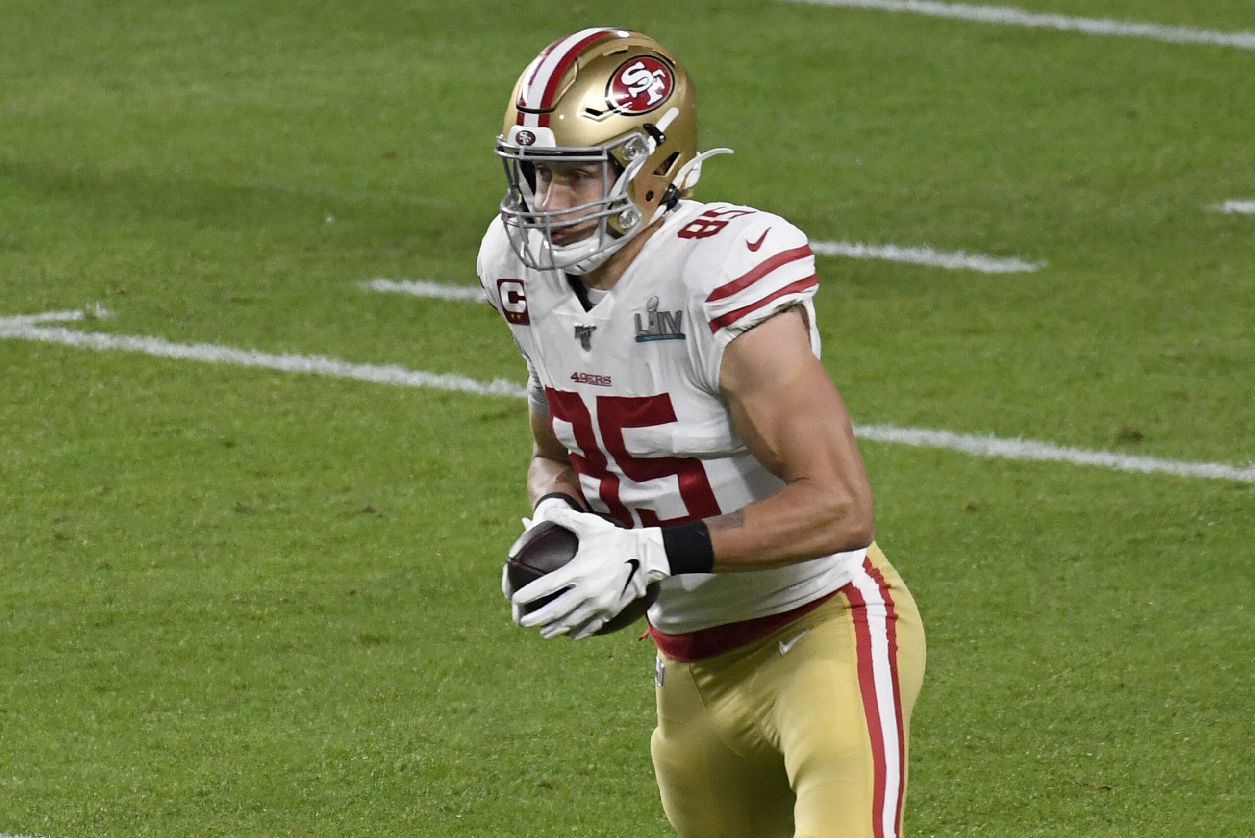 MIAMI, FLORIDA - FEBRUARY 02: George Kittle #85 of the San Francisco 49ers runs with the ball after catching a pass against the Kansas City Chiefs in Super Bowl LIV at Hard Rock Stadium on February 02, 2020 in Miami, Florida. The Chiefs won the game 31-20. (Photo by Focus on Sport/Getty Images) MIAMI, FLORIDA - FEBRUARY 02: George Kittle #85 of the San Francisco 49ers runs with the ball after catching a pass against the Kansas City Chiefs in Super Bowl LIV at Hard Rock Stadium on February 02, 2020 in Miami, Florida. The Chiefs won the game 31-20. (Photo by Focus on Sport/Getty Images)