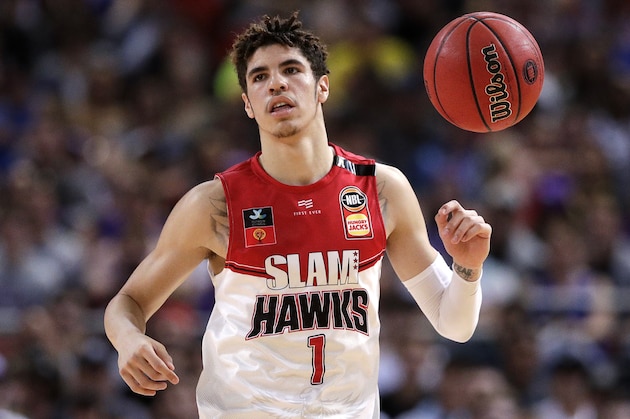 LaMelo Ball of the Illawarra Hawks brings the ball up during their game against the Sydney Kings in the Australian Basketball League in Sydney, Sunday, Nov. 17, 2019. (AP Photo/Rick Rycroft)