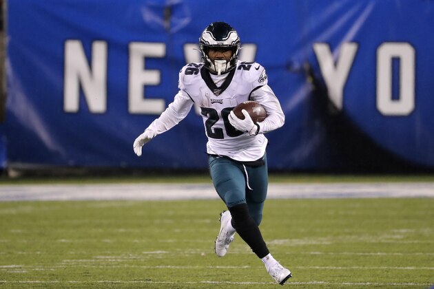 Philadelphia Eagles running back Miles Sanders (26) runs with the ball in the first half of an NFL football game against the New York Giants, Sunday, Dec. 29, 2019, in East Rutherford, N.J. (AP Photo/Seth Wenig)