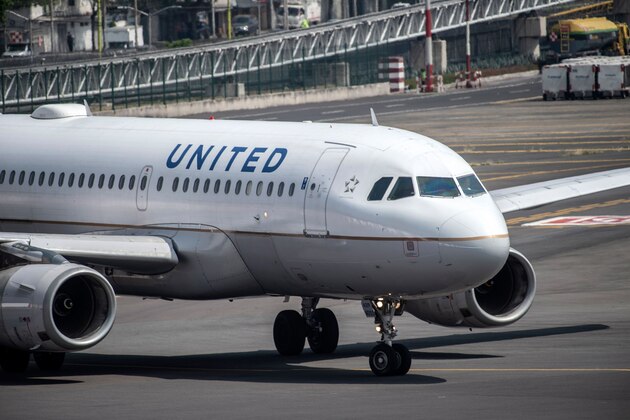 A United Airlines plane prepares to take off at the Benito Juarez International airport in Mexico City, on March 20, 2020. - International flights keep operating in Mexico, unlike most other countries which have closed airports due to the outbreak of the new coronavirus, COVID-19. (Photo by PEDRO PARDO / AFP) (Photo by PEDRO PARDO/AFP via Getty Images)