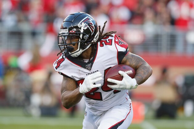 SANTA CLARA, CALIFORNIA - DECEMBER 15: Running back Devonta Freeman #24 of the Atlanta Falcons runs the ball in the third quarter against the San Francisco 49ers at Levi's Stadium on December 15, 2019 in Santa Clara, California. (Photo by Lachlan Cunningham/Getty Images)