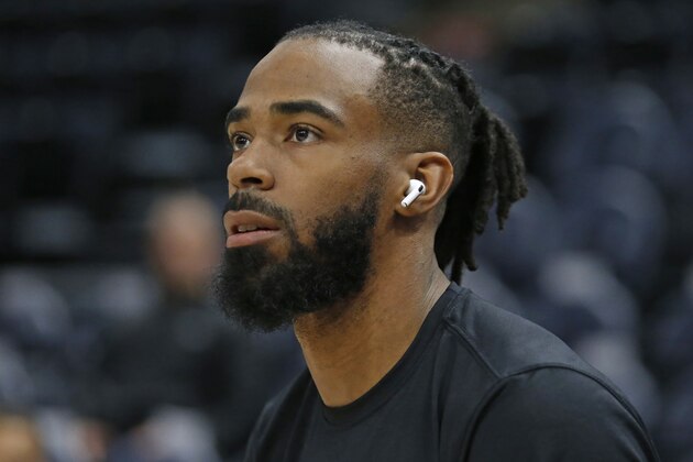 Utah Jazz guard Mike Conley warms up during practice before the start of their NBA basketball game against the Phoenix Suns Monday, Feb. 24, 2020, in Salt Lake City. (AP Photo/Rick Bowmer)