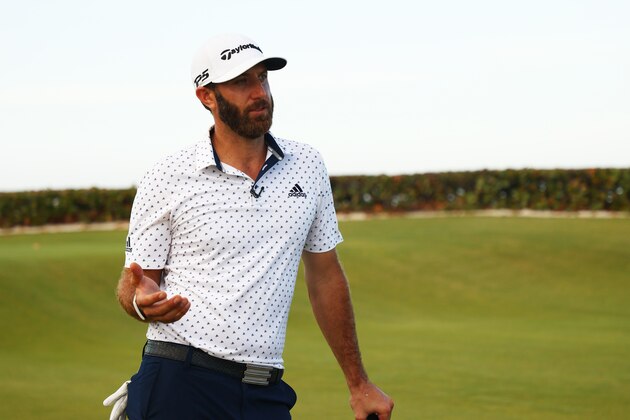 JUNO BEACH, FLORIDA - MAY 17: Dustin Johnson of the American Nurses Foundation team reacts after he and Rory McIlroy of the American Nurses Foundation team defeated Matthew Wolff of the CDC Foundation team and Rickie Fowler of the CDC Foundation team in a closest to the pin playoff on the 17th hole during the TaylorMade Driving Relief Supported By UnitedHealth Group on May 17, 2020 at Seminole Golf Club in Juno Beach, Florida. (Photo by Mike Ehrmann/Getty Images)