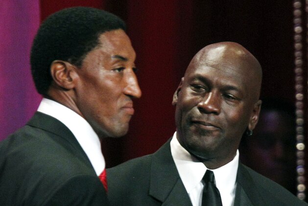 2010 Basketball Hall of Fame inductee Scottie Pippen, left, stands with former teammate Michael Jordan during the enshrinement ceremony in Springfield, Mass. Friday, Aug. 13, 2010. (AP Photo/Elise Amendola)