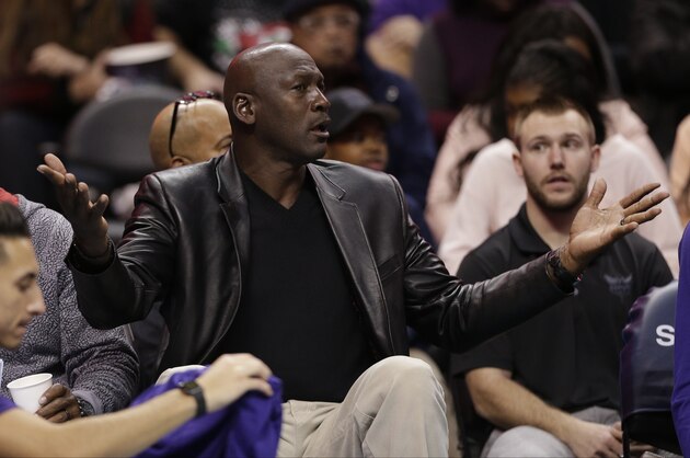 Charlotte Hornets owner Michael Jordan argues a call in the second half of an NBA basketball game against the Chicago Bulls in Charlotte, N.C., Friday, Dec. 23, 2016. The Hornets won 103-91. (AP Photo/Chuck Burton) Charlotte Hornets owner Michael Jordan argues a call in the second half of an NBA basketball game against the Chicago Bulls in Charlotte, N.C., Friday, Dec. 23, 2016. The Hornets won 103-91. (AP Photo/Chuck Burton)