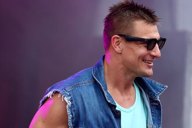 MIAMI, FLORIDA - FEBRUARY 01: Rob Gronkowski is seen on stage during MIAMI, FLORIDA - FEBRUARY 01: Rob Gronkowski is seen on stage during