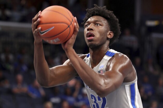 Memphis' James Wiseman (32) shoots a basket during the second half of an NCAA college basketball game against Illinois-Chicago, Friday, Nov. 8, 2019, in Memphis, Tenn. (AP Photo/Karen Pulfer Focht)