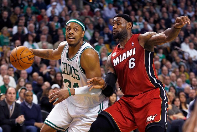 BOSTON, MA - MARCH 18:  LeBron James #6 of the Miami Heat  defends against Paul Pierce #34 of the Boston Celtics in the fourth quarter against the Boston Celtics on March 18, 2013 at theTD Garden in Boston, Massachusetts.  The Heat kept winning streak going to 24 games in a row, which is the second longest winning streak in NBA history.  NOTE TO USER: User expressly acknowledges and agrees that, by downloading and or using this photograph, User is consenting to the terms and conditions of the Getty Images License Agreement. (Photo by Jim Rogash/Getty Images)