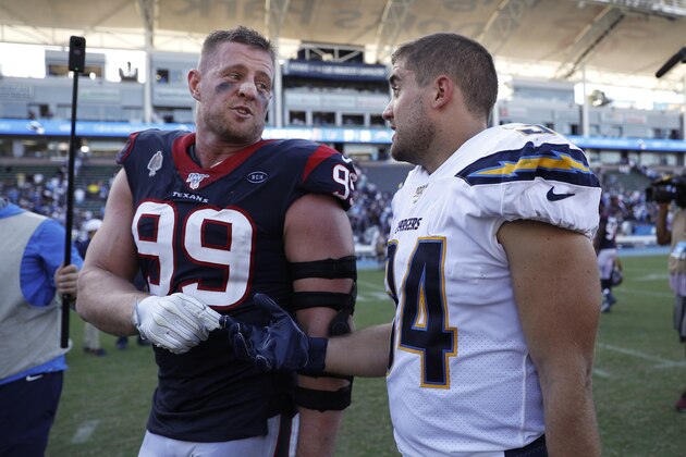 CARSON, CALIFORNIA - SEPTEMBER 22: Defensive end J.J. Watt #99 of the Houston Texans and brother fullback Derek Watt #34 of the Los Angeles Chargers talk after the game at Dignity Health Sports Park on September 22, 2019 in Carson, California. (Photo by Meg Oliphant/Getty Images)