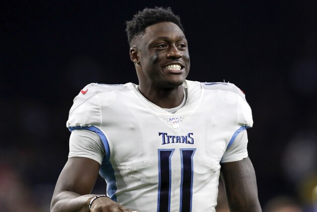 HOUSTON, TX - DECEMBER 29: A.J. Brown #11 of the Tennessee Titans celebrates on the way to the locker room after the game against the Houston Texans at NRG Stadium on December 29, 2019 in Houston, Texas. (Photo by Tim Warner/Getty Images) HOUSTON, TX - DECEMBER 29: A.J. Brown #11 of the Tennessee Titans celebrates on the way to the locker room after the game against the Houston Texans at NRG Stadium on December 29, 2019 in Houston, Texas. (Photo by Tim Warner/Getty Images)
