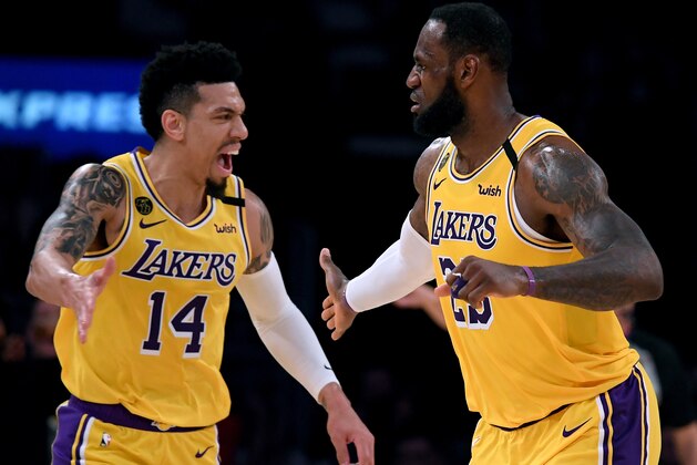 LOS ANGELES, CALIFORNIA - MARCH 06:  LeBron James #23 of the Los Angeles Lakers celebrates his basket with Danny Green #14 during a 113-103 Laker win over the Milwaukee Bucks at Staples Center on March 06, 2020 in Los Angeles, California.  NOTE TO USER: User expressly acknowledges and agrees that, by downloading and or using this photograph, User is consenting to the terms and conditions of the Getty Images License Agreement.  (Photo by Harry How/Getty Images)