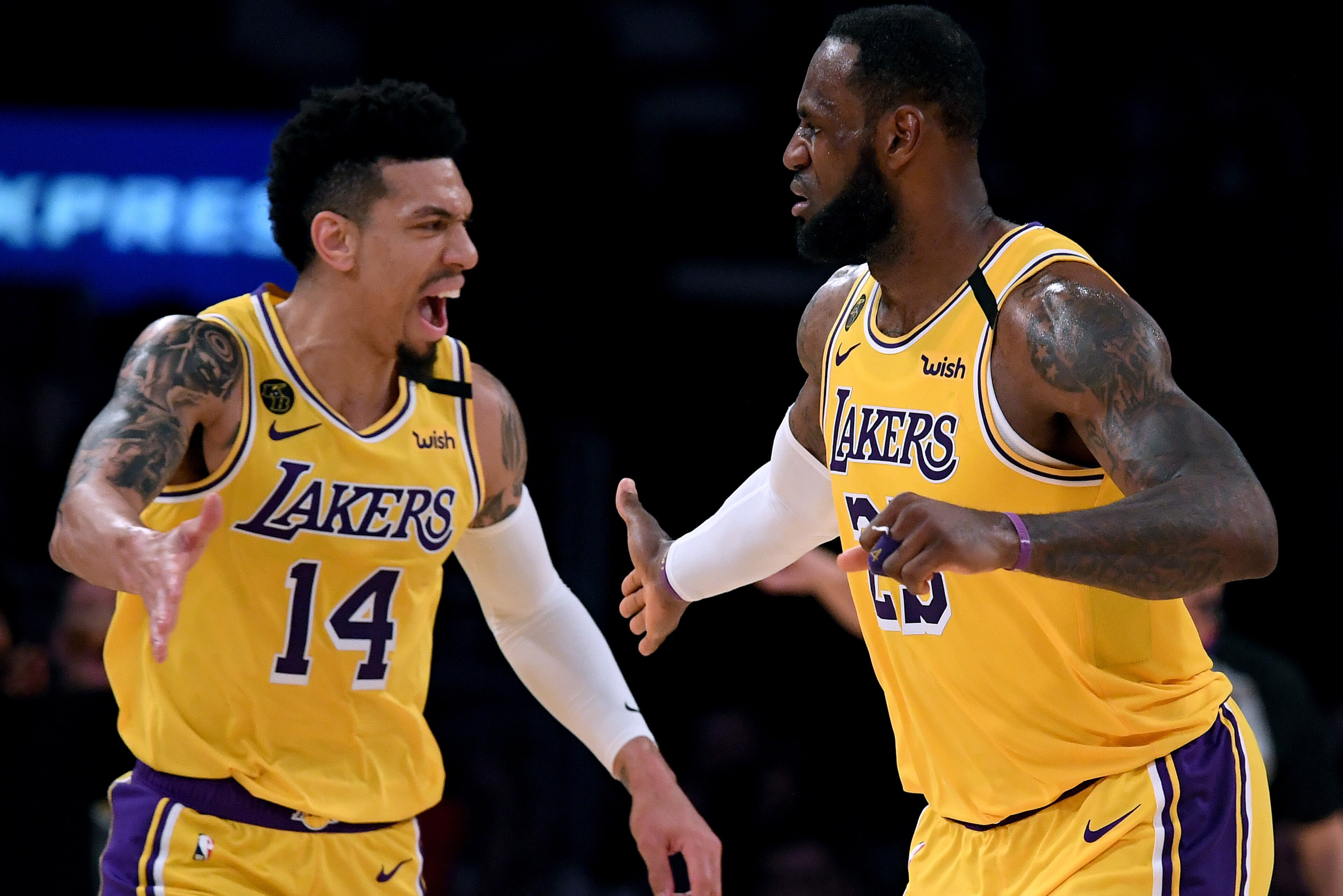 LOS ANGELES, CALIFORNIA - MARCH 06:  LeBron James #23 of the Los Angeles Lakers celebrates his basket with Danny Green #14 during a 113-103 Laker win over the Milwaukee Bucks at Staples Center on March 06, 2020 in Los Angeles, California.  NOTE TO USER: User expressly acknowledges and agrees that, by downloading and or using this photograph, User is consenting to the terms and conditions of the Getty Images License Agreement.  (Photo by Harry How/Getty Images)