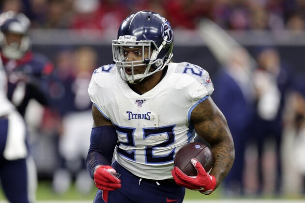 Tennessee Titans running back Derrick Henry (22) rushes against the Houston Texans during the first half of an NFL football game Sunday, Dec. 29, 2019, in Houston. (AP Photo/Michael Wyke)