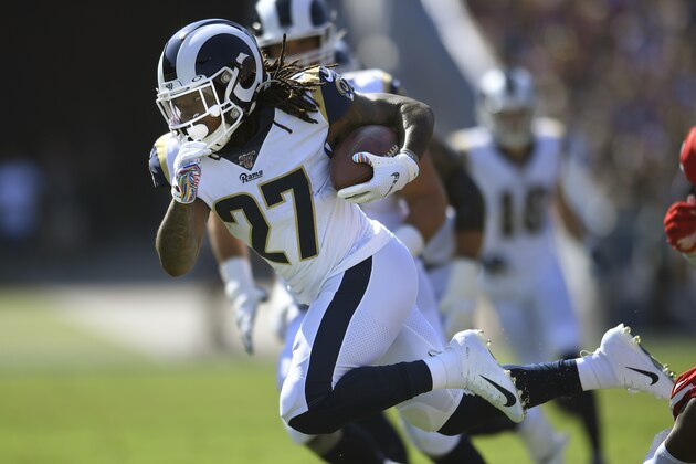LOS ANGELES, CA - OCTOBER 13: Darrell Henderson #27 of the Los Angeles Rams runs the ball against the San Francisco 49ers at Los Angeles Memorial Coliseum on October 13, 2019 in Los Angeles, California. San Francisco won 20-7. (Photo by John McCoy/Getty Images) LOS ANGELES, CA - OCTOBER 13: Darrell Henderson #27 of the Los Angeles Rams runs the ball against the San Francisco 49ers at Los Angeles Memorial Coliseum on October 13, 2019 in Los Angeles, California. San Francisco won 20-7. (Photo by John McCoy/Getty Images)