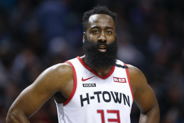 Houston Rockets guard James Harden stands on the court during a break in the action against the Charlotte Hornets during the second half of an NBA basketball game in Charlotte, N.C., Saturday, March 7, 2020. Charlotte won 108-99. (AP Photo/Nell Redmond)