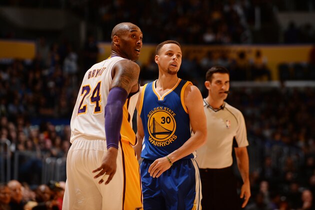 LOS ANGELES, CA - MARCH 6:  Kobe Bryant #24 of the Los Angeles Lakers stands on the court against Stephen Curry #30 of the Golden State Warriors on March 6, 2016 at STAPLES Center in Los Angeles, California. NOTE TO USER: User expressly acknowledges and agrees that, by downloading and/or using this Photograph, user is consenting to the terms and conditions of the Getty Images License Agreement. Mandatory Copyright Notice: Copyright 2016 NBAE (Photo by Noah Graham/NBAE via Getty Images)