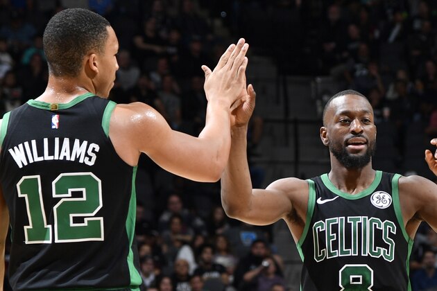SAN ANTONIO, TX - NOVEMBER 9: Kemba Walker #8 and Grant Williams #12 of the Boston Celtics hi-five during a game against the San Antonio Spurs on November 9, 2019 at the AT&T Center in San Antonio, Texas. NOTE TO USER: User expressly acknowledges and agrees that, by downloading and or using this photograph, user is consenting to the terms and conditions of the Getty Images License Agreement. Mandatory Copyright Notice: Copyright 2019 NBAE (Photos by Logan Riely/NBAE via Getty Images)