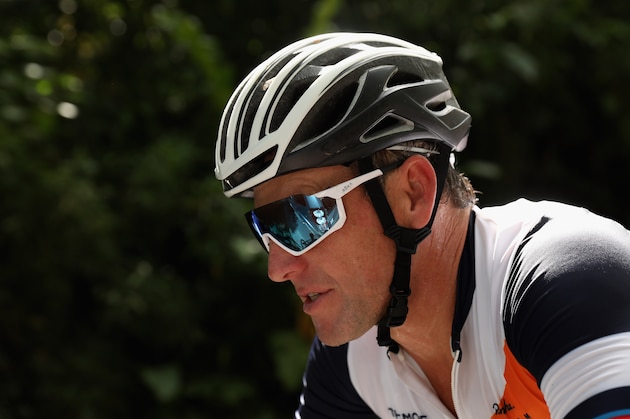 LIMON, COSTA RICA - NOVEMBER 03:  Lance Armstrong of the United States rides in the peloton during the rolling start on Day 3 of La Ruta de Los Conquistadores on November 3, 2018 in Limon, Costa Rica. during Day 1 of the La Ruta de Los Conquistadores on November 1, 2018 in Jaco, Costa Rica.  La Ruta de Los Conquistadores is Costa RicaÕs premier mountain bike race, and one of the most difficult races in the world. It is a 3-day stage race that crosses Costa Rica from the Pacific Coast in the west to the Caribbean coast in the east.
Between its sea-level start and finish, the 161-mile route crosses 5 mountain ranges that force you climb a cumulative 29,000 feet.  The route snakes through tropical rain forest, 12,000 feet volcanoes, banana plantations and tiny farm towns. It covers every imaginable riding surfaceÑ single track and fire road trails, gravel, hard-packed dirt, pavement, thigh-deep mud, sand, volcano ash, and more. 
The race was started in 1993 by Roman Urbina. Urbina, an elite athlete and adventure