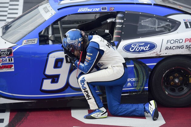 DARLINGTON, SOUTH CAROLINA - MAY 21: Chase Briscoe, driver of the #98 HighPoint.com Ford, exits hiscar after wining  the NASCAR Xfinity Series Toyota 200 at Darlington Raceway on May 21, 2020 in Darlington, South Carolina. (Photo by Jared C. Tilton/Getty Images)