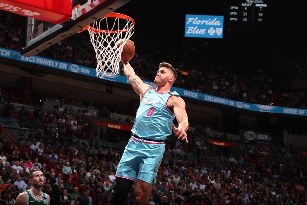 MIAMI, FL - JANUARY 28: Meyers Leonard #0 of the Miami Heat dunks the ball during a game against the Boston Celtics on January 28, 2020 at American Airlines Arena in Miami, Florida. NOTE TO USER: User expressly acknowledges and agrees that, by downloading and or using this Photograph, user is consenting to the terms and conditions of the Getty Images License Agreement. Mandatory Copyright Notice: Copyright 2020 NBAE (Photo by Issac Baldizon/NBAE via Getty Images)