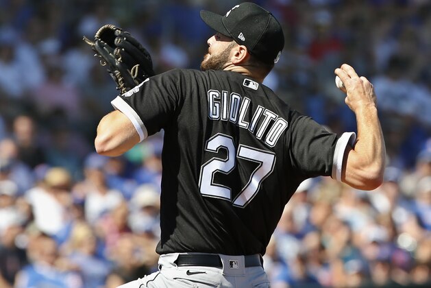 Chicago White Sox starting pitcher Lucas Giolito (27) pitches in the first inning of a spring training baseball game against the Chicago Cubs, Friday, March 6, 2020, in Mesa, Ariz. (AP Photo/Sue Ogrocki)