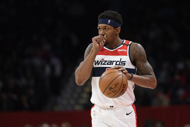 Washington Wizards guard Bradley Beal (3) dribbles the ball during the second half of an NBA basketball game against the Miami Heat, Sunday, March 8, 2020, in Washington. The Heat won 100-89. (AP Photo/Nick Wass)
