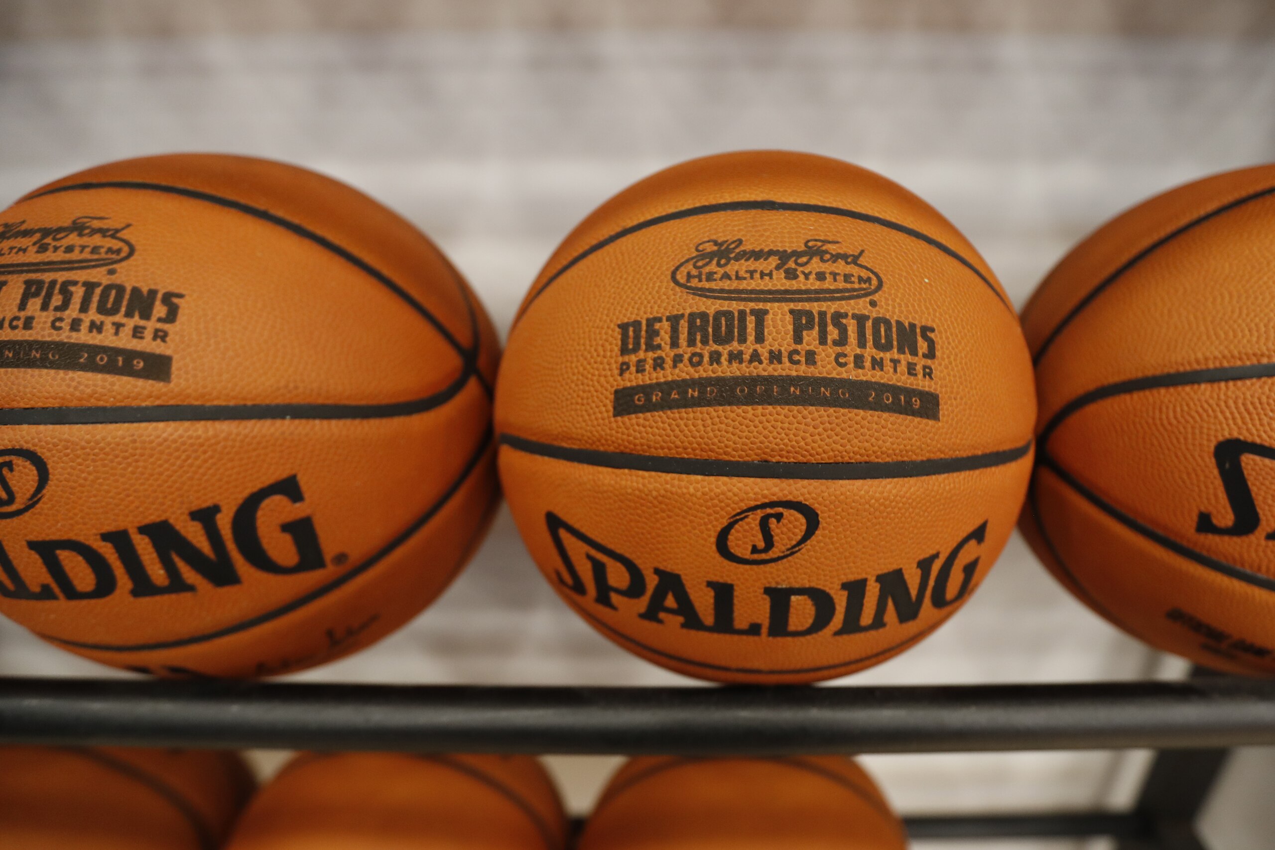 Basketballs sporting the Henry Ford Detroit Pistons Performance Center logo are displayed Monday, Oct. 7, 2019, in Detroit. The $90 million center includes a sports medicine, treatment and rehab facility managed by the Henry Ford Health System, as well as retail and public spaces. (AP Photo/Carlos Osorio) Basketballs sporting the Henry Ford Detroit Pistons Performance Center logo are displayed Monday, Oct. 7, 2019, in Detroit. The $90 million center includes a sports medicine, treatment and rehab facility managed by the Henry Ford Health System, as well as retail and public spaces. (AP Photo/Carlos Osorio)