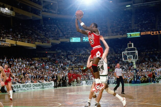 BOSTON, MA - 1986: Michael Jordan #23 of the Chicago Bulls shoots the ball against the Boston Celtics circa 1986 at the Boston Garden in Boston, Massachusetts. NOTE TO USER: User expressly acknowledges and agrees that, by downloading and/or using this photograph, user is consenting to the terms and conditions of the Getty Images License Agreement. Mandatory Copyright Notice: Copyright 1986 NBAE (Photo by Dick Raphael/NBAE via Getty Images)