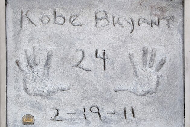 UNSPECIFIED,  - MAY 01: (EDITORIAL USE ONLY) This handout image provided by Julien’s Auctions shows a pair of original Kobe Bryant handprints in cement from Grauman's Chinese Theater in Hollywood. Kobe immortalized his handprints on February 19, 2011, the five-time NBA champion became the first athlete to cast prints at Grauman’s Chinese Theatre. This pair of handprints are test prints done before the official ceremony hosted by Jimmy Kimmel. The Sports Legends auction, hosted by Julien’s Auctions, will take place on May 21, 2020, and features over 300 historic sports artifacts including Kobe Bryant game-worn items, as well as a collection of FIFA World Cup, Confederations Cup and Olympic Medals.  (Photo by Handout/Julien’s Auctions via Getty Images)