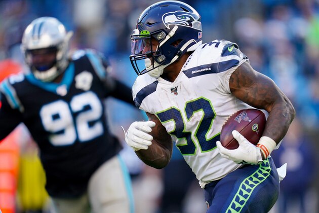 CHARLOTTE, NORTH CAROLINA - DECEMBER 15: Chris Carson #32 of the Seattle Seahawks during the second half during their game against the Carolina Panthers at Bank of America Stadium on December 15, 2019 in Charlotte, North Carolina. (Photo by Jacob Kupferman/Getty Images)