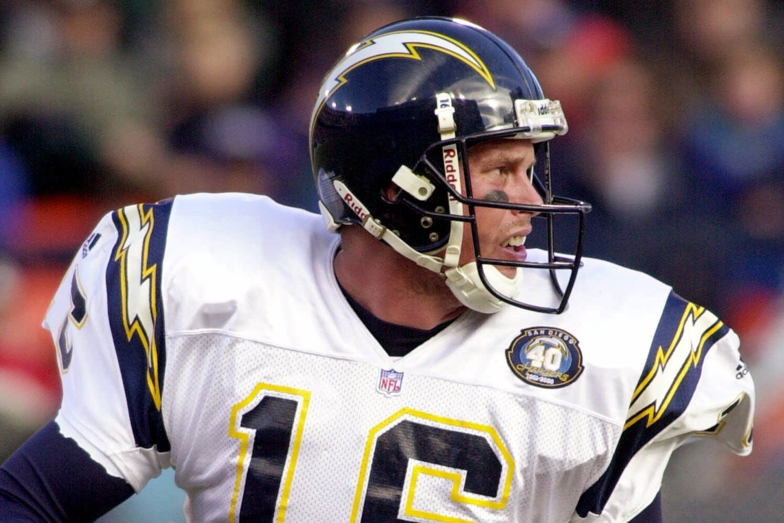 FILE - In this Nov. 19, 2000 file photo, San Diego Chargers quarterback Ryan Leaf rolls out of the pocket as he looks for a receiver in the first quarter against the Denver Broncos in Denver. Leaf posted a $45,000 bond Wednesday June 17, 2009 in Washington state for drug and burglary charges out of Texas after being arrested by customs agents as he returned to the United States from Canada. (AP Photo/Kevin Higley, File) FILE - In this Nov. 19, 2000 file photo, San Diego Chargers quarterback Ryan Leaf rolls out of the pocket as he looks for a receiver in the first quarter against the Denver Broncos in Denver. Leaf posted a $45,000 bond Wednesday June 17, 2009 in Washington state for drug and burglary charges out of Texas after being arrested by customs agents as he returned to the United States from Canada. (AP Photo/Kevin Higley, File)