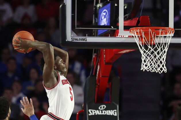 Georgia guard Anthony Edwards (5) scores in the first half of an NCAA college basketball game against Kentucky Tuesday, Jan. 7, 2020, in Athens, Ga. (AP Photo/John Bazemore)