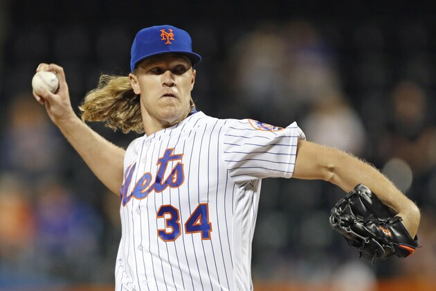New York Mets starting pitcher Noah Syndergaard winds up during the first inning of a baseball game against the Miami Marlins, Tuesday, Sept. 24, 2019, in New York. (AP Photo/Kathy Willens)