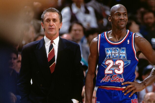 SALT LAKE CITY, UT - FEBRUARY 21: Head Coach Pat Riley and Michael Jordan #23 of the Eastern Conference All-Stars looks on against the Western Conference All-Stars during the 1993 All-Star Game on February 21, 1993 at the Delta Center in Salt Lake City, Utah. The West defeated the Eats 135-132 in OT. NOTE TO USER: User expressly acknowledges and agrees that, by downloading and or using this Photograph, user is consenting to the terms and conditions of the Getty Images License Agreement. Mandatory Copyright Notice: Copyright 1993 NBAE (Photo by Andrew D. Bernstein/NBAE via Getty Images)