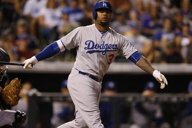 Los Angeles Dodgers left fielder Carl Crawford (3) bats against the Colorado Rockies in the seventh inning of a baseball game Saturday, Sept. 26, 2015, in Denver. The Rockies won 8-6 on the walkoff, two-run home run hit by Gonzalez. (AP Photo/David Zalubowski)