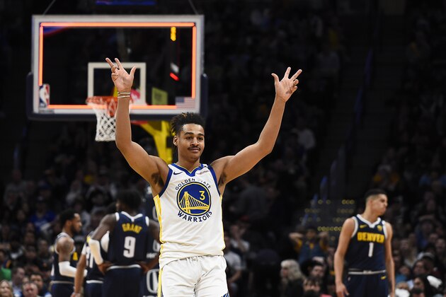 Golden State Warriors guard Jordan Poole (3) reacts after making a 3-pointer at the end of the third quarter against the Denver Nuggets in an NBA basketball game Tuesday, March 3, 2020, in Denver. The Warriors won 116-100. (AP Photo/John Leyba)