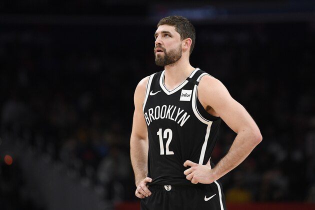 Brooklyn Nets forward Joe Harris (12) looks on during the second half of an NBA basketball game against the Washington Wizards, Saturday, Feb. 1, 2020, in Washington. The Wizards won 113-107. (AP Photo/Nick Wass)