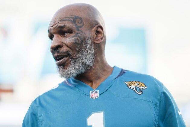 JACKSONVILLE, FLORIDA - SEPTEMBER 19: Mike Tyson looks on before the start of the Jacksonville Jaguars against the Tennessee Titans at TIAA Bank Field on September 19, 2019 in Jacksonville, Florida. (Photo by James Gilbert/Getty Images)