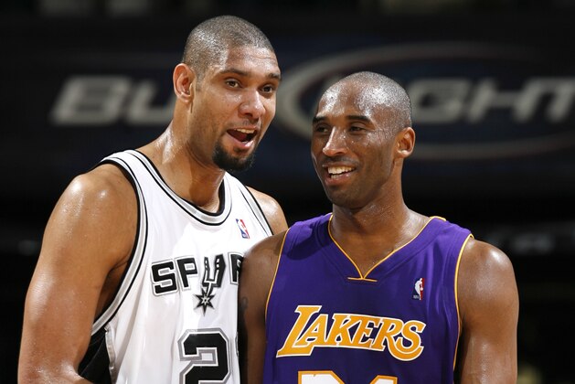 SAN ANTONIO, TX - JANUARY 12: Tim Duncan #21 of the San Antonio Spurs and Kobe Bryant #24 of the Los Angeles Lakers exchange comments during their game on January 12, 2010 at the AT&T Center in San Antonio, Texas. NOTE TO USER: User expressly acknowledges and agrees that, by downloading and/or using this photograph, user is consenting to the terms and conditions of the Getty Images License Agreement. Mandatory Copyright Notice: Copyright 2009 NBAE (Photo by Chris Covatta/NBAE via Getty Images)