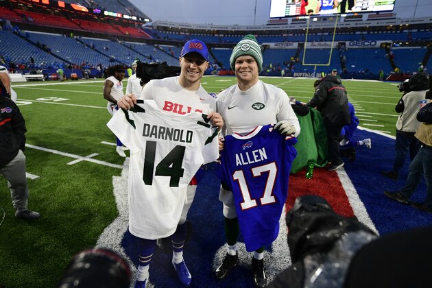 New York Jets quarterback Sam Darnold, right, poses for photographs with Buffalo Bills quarterback Josh Allen after an NFL football game Sunday, Dec. 29, 2019 in Orchard Park, N.Y. The Jets won 13-6. (AP Photo/David Dermer)