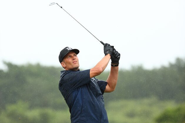 HOBE SOUND, FLORIDA - MAY 24: NFL player Tom Brady of the Tampa Bay Buccaneers plays a shot on the first hole during The Match: Champions For Charity at Medalist Golf Club on May 24, 2020 in Hobe Sound, Florida. (Photo by Mike Ehrmann/Getty Images for The Match)