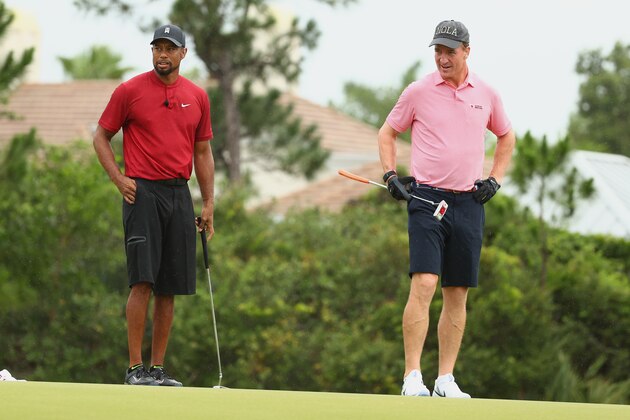 HOBE SOUND, FLORIDA - MAY 24: Tiger Woods and former NFL player Peyton Manning look on from the fourth green during The Match: Champions For Charity at Medalist Golf Club on May 24, 2020 in Hobe Sound, Florida. (Photo by Mike Ehrmann/Getty Images for The Match)