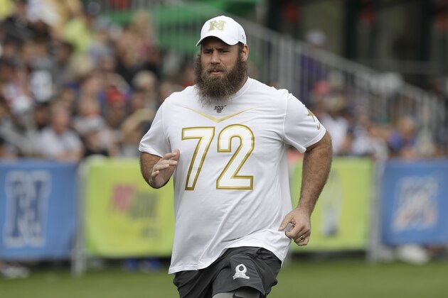 NFC center Travis Frederick, of the Dallas Cowboys, (72) runs sprints during a practice for the NFL Pro Bowl football game Thursday, Jan. 23, 2020, in Kissimmee, Fla. (AP Photo/Chris O'Meara)